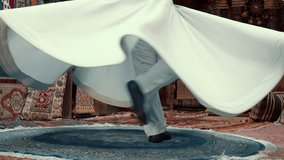 Sufi Whirling Dervish dance in traditional dress. Turkey