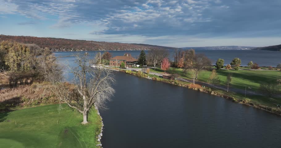 Fall, autumn, drone aerial videos with view of Stewart Park at the south end of Cayuga Lake, Ithaca New York.  11-03-2024