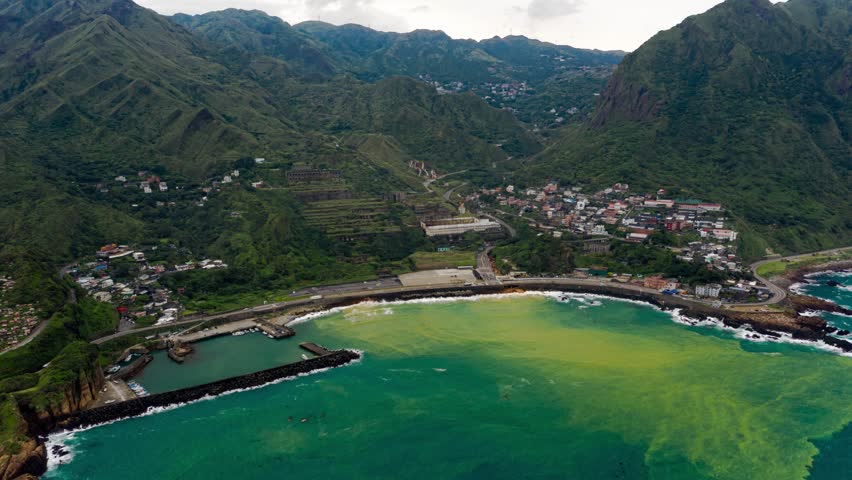 Drone hyperlapse, time-lapse, Yin Yang Sea, due to long-term copper mine emissions pollution, the coast has two colors,abandoned copper mines, unique landcape of the mountain taipei,taiwan