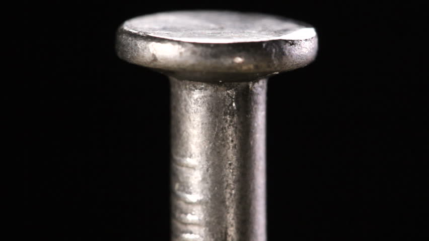 Hammer striking nail