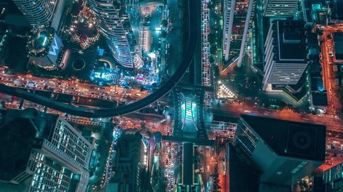 Time lapse,Hyper lapse ,Of traffic on city streets at night. Aerial view and top view of traffic on freeway, 4K.