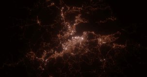 Hobart (Australia) top view at night. View on modern city from satellite. Camera is zooming in, rotating counterclockwise. Vertical video. The north is on the left side