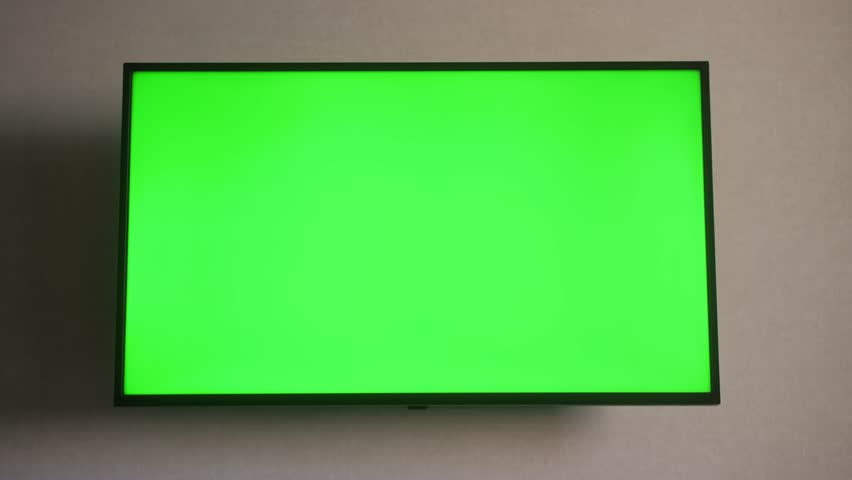 TV set with green screen mock up display in hotel room.