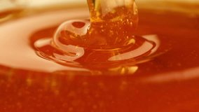 Pouring honey, flowing liquid sugar syrup. Thick Honey Dripping close up - Powered by Shutterstock - Get 15% off with code: PIKWIZARD15