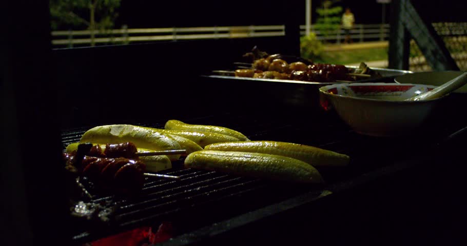 Preparing grilled bananas is a popular dish in Ecuador.