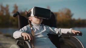 Female kid with disability plays computer game using VR headset. Preschooler girl moves head looking at new location on blurred background closeup - Powered by Shutterstock - Get 15% off with code: PIKWIZARD15