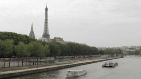 The Seine Rive with The Eiffel Tower in the background in Paris, France