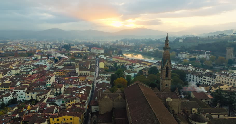 Basilica Beauty: A Panoramic Aerial Odyssey Unveiling Santa Croce in Florence's Urban Landscape, Drenched in the Warmth of Sunset. High quality 4k footage Royalty-Free Stock Footage #3425130089