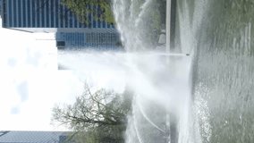 Fountain in spring in the city. Vertical video. 