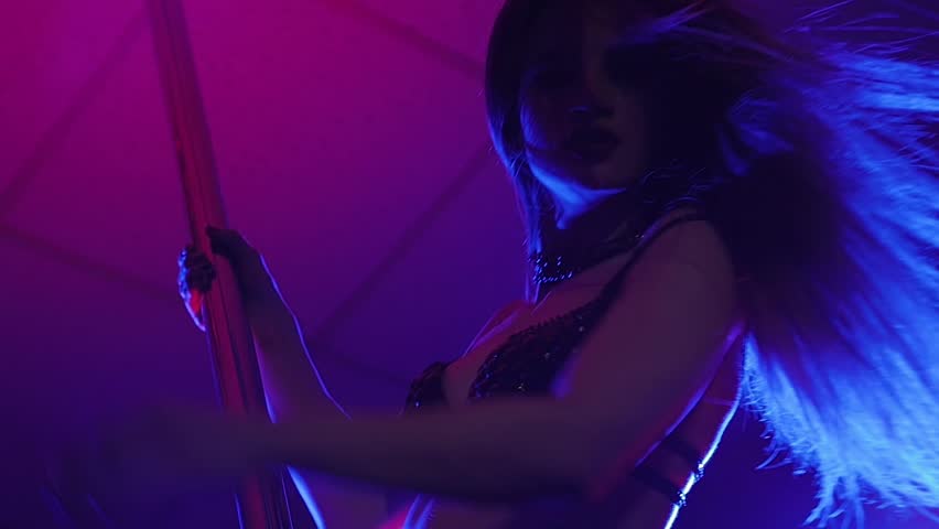 Beautiful Girl Dances Pole Dance, Black, Blue, Red Studio | Shutterstock HD Video #34256542