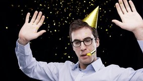 Man, party horn and dancing in studio confetti for celebration, winning and success of new year. Excited business person singing in glasses with party hat, glitter and sparkle on a black background - Powered by Shutterstock - Get 15% off with code: PIKWIZARD15