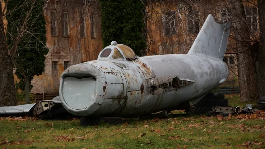 The wreckage of the downed plane lies on the ground. Plane crash. Plane crash concept, downed plane.