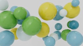 Abstract background with moving soft yellow, blue, green and white colored balls or air balloons on white background. 3D animation. 4K. alpha channel - Powered by Shutterstock - Get 15% off with code: PIKWIZARD15
