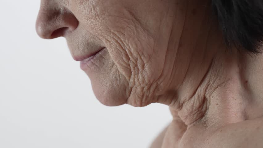 Lower face of a elderly woman with wrinkled skin Royalty-Free Stock Footage #3425916379