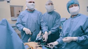 Video endoscopic surgery. A surgeon performs an operation to remove the gallbladder in the clinic. 