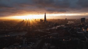 Dramatic Light, Sun Setting, Aerial View Shot of London UK, United Kingdom, day, daytime, Shard Tower Bridge Tower of London