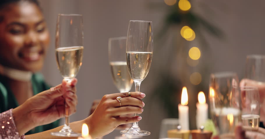Group, hands and champagne toast for new year, celebration and party with business people in night. People, men and women with glasses, drink or sparkling wine for cheers, wish or happy at gala event