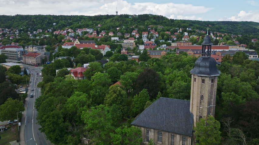 Aerial drone view of Botanical Garden ( Botanischer Garten ) in Jena , Thuringia, Germany . The Botanischer Garten Jena is the second oldest botanical garden in Germany . Royalty-Free Stock Footage #3426360891