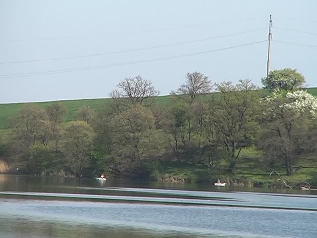 Boats far away on the lake