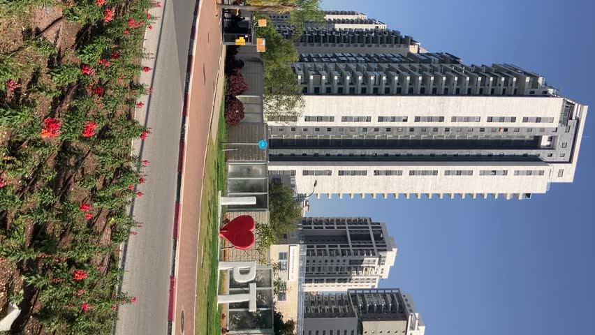 Petah Tikva is a city in Israel. The symbol of the city against the backdrop of a new residential area. I love Petah Tikva