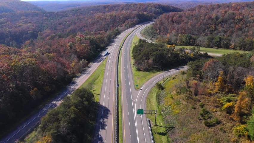 scenic aerial view on the highway in the Appalachian, Pennsylvania.  Aerial video with the forward camera motion.
