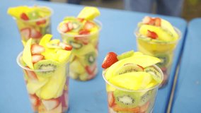 4k HDR footage fruits in cups for sale