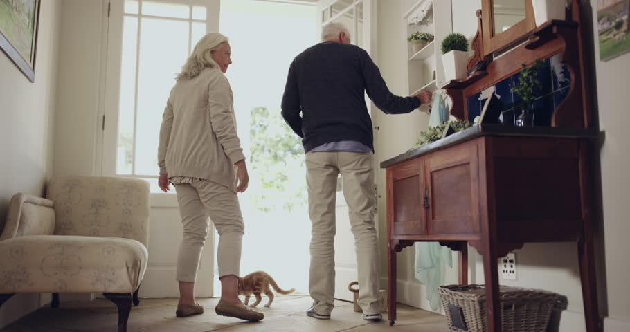 Senior couple, front door and leaving home for walk, together and ready for outdoor activity. Elderly people, bonding and person with a disability in marriage, cane and enjoying retirement or back
