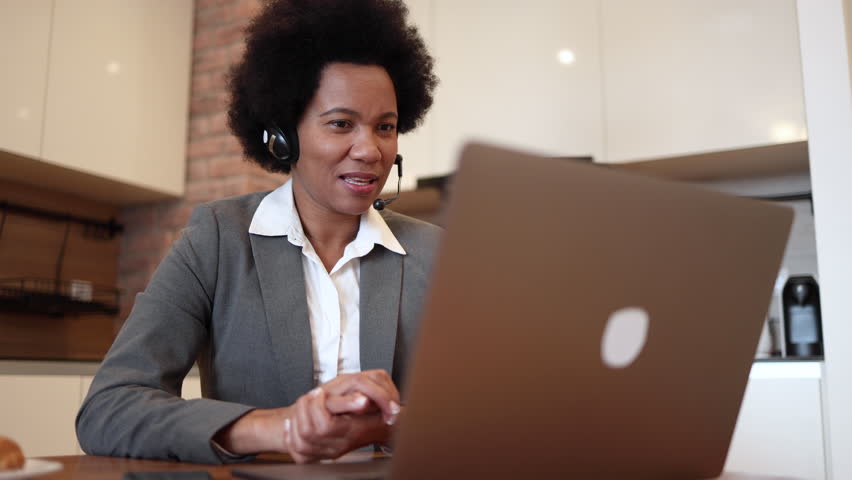 African American woman working in a call center