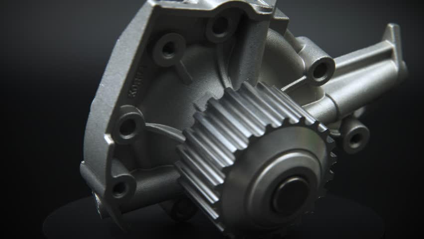 Auto parts car spare parts on a black background. The new ICE water cooling pump rotates on a turntable around its axis. Auto parts store. Engine car details Royalty-Free Stock Footage #3426887589
