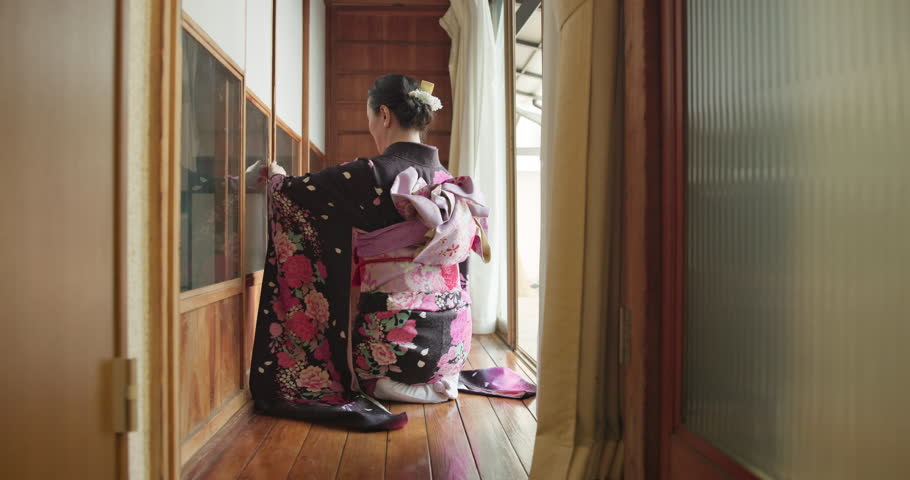 Woman, japanese tea ceremony and culture tradition in tatami room for healing ritual, harmony or calm environment. Female person, kimono dress and drink for herb detox, religious experience or health