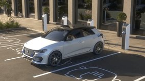 Generic autonomous electric car charging at charging station on a parking lot in front of an office building. Decarbonisation and zero emission concept. Realistic 3d animation rendering. - Powered by Shutterstock - Get 15% off with code: PIKWIZARD15