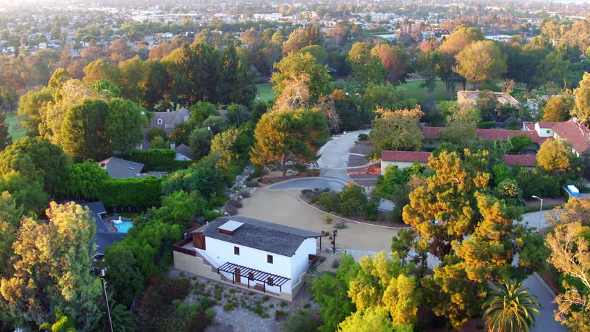 Aerial Panning Shot Of Roofed Houses And Green Trees In City - Long Beach, California