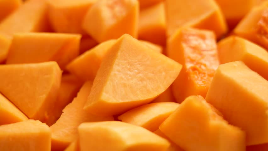 Sliced butternut squash pumpkin. Organic vegetable raw ingredients. Rotation