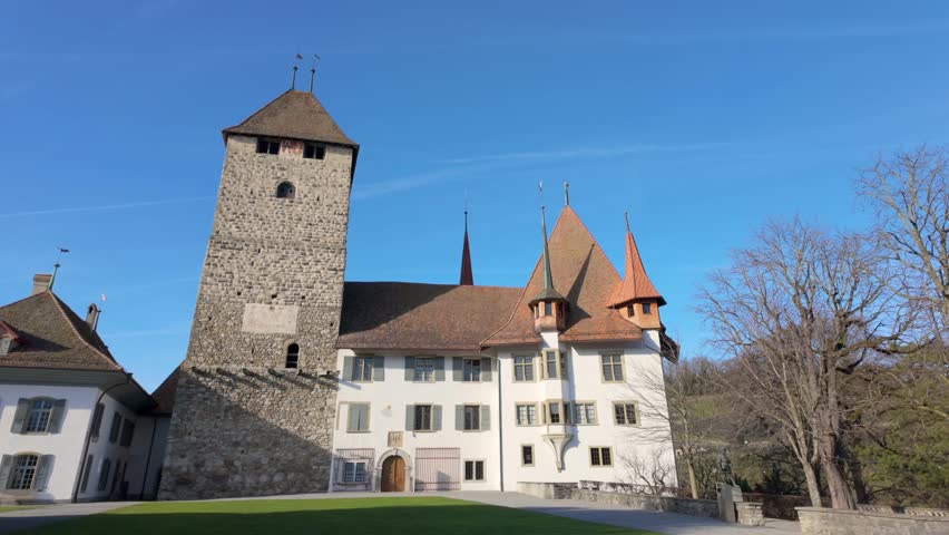 Low angle shot of historic Spiez Castle in Switzerland on a sunny day