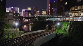 4k Multiple Tokyo Trains Departing Ochanomizu Station Towards Akihabara at Night - Powered by Shutterstock - Get 15% off with code: PIKWIZARD15