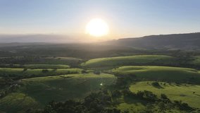 Sunset Skyline at Scenic Green Valley Mountains. Rural Life Scene. Sunset Countryside Scenery. Golden Hour Sunset Landscape. Colorful Sunset Sky Clouds. Bright Sunlight Mountains. Green Valley. - Powered by Shutterstock - Get 15% off with code: PIKWIZARD15