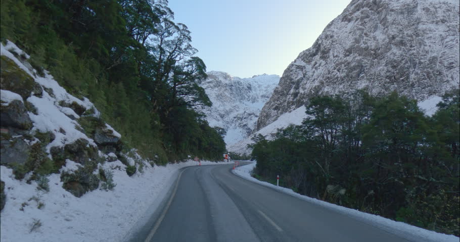 South Island, New Zealand - Traveling Along a Road on a Winter Day in Fiordland National Park - POV  Royalty-Free Stock Footage #3427460355