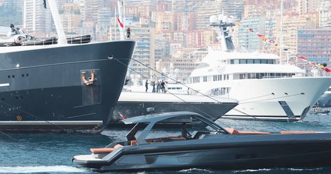 Monaco, Monte-Carlo, 29 September 2017: The largest fair exhibition in the world Yacht show MYS, port Hercules, a lot of new mega yachts, rich clients, brokers, sunny weather, boat traffic in marina