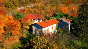 Aerial 4K drone video unveils the haunting beauty of Slapnik, an abandoned village in Brda, Slovenia. It is a place where nobody lives and where decaying structures are being reclaimed by the nature.