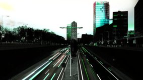 stop motion urban scene of traffic on a major road at dusk in barcelona, spain