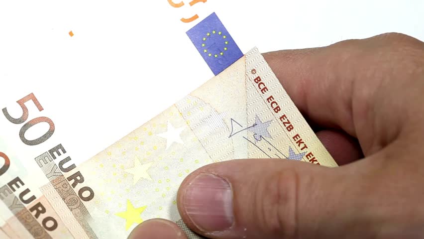 Fifty euros banknotes pack. Shot of Hands Account a 50 Euro Banknote Bundle. A lot of bills in a fifty euros spread out on the desk. Counting fifty Euro banknotes. money bills, european economy value. Royalty-Free Stock Footage #3427615437