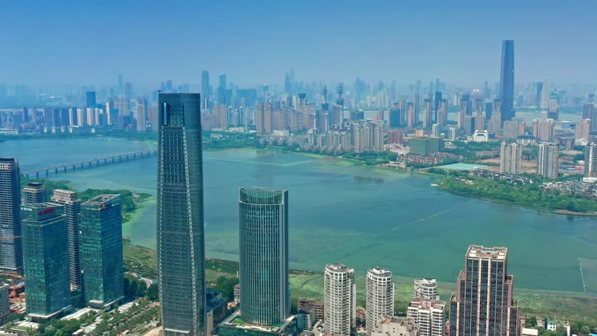 Wuhan skyline and Yangtze river with supertall skyscraper under construction in Wuhan Hubei China.