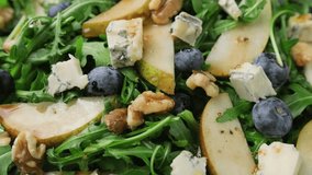 Pear Gorgonzola cheese, blueberries and Walnut Salad. Healthy food - Powered by Shutterstock - Get 15% off with code: PIKWIZARD15