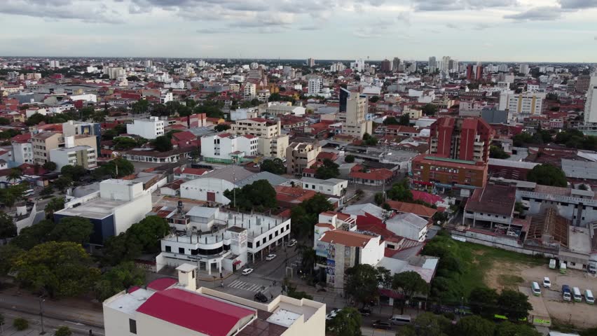 Low rooftop flyover of large city, Santa Cruz de la Sierra in Bolivia Royalty-Free Stock Footage #3427963881