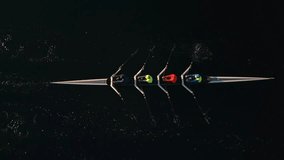 Top view of a rowing team rowing in an ocean bay at a beautiful sunrise, Halifax, Canada. Aerial view of kayaking and canoeing synchronized team of athletes training in the Atlantic ocean  - Powered by Shutterstock - Get 15% off with code: PIKWIZARD15