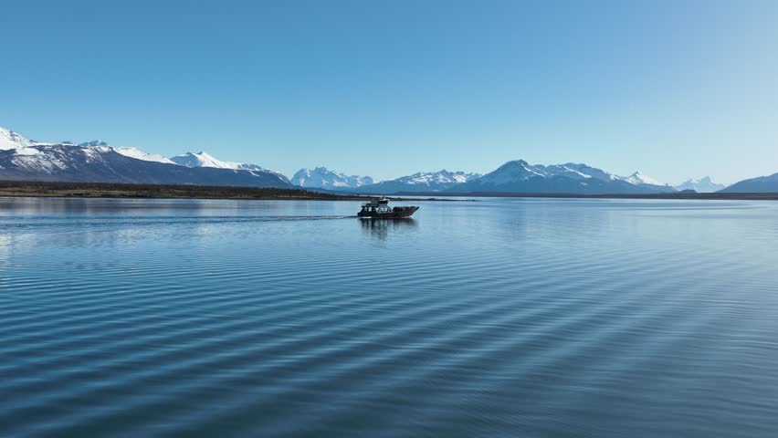 Boat Sailing At Puerto Natales Magallanes Chile. River Background Puerto Natales Magallanes. Idyllic Lake Ranch Amazing. Idyllic Forest Trees Ranch Snowy Nature. Idyllic Amazing Sunlight Environment.