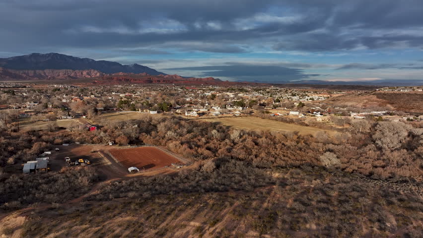 Aerial rural desert landscape homes Washington Utah 1. Southwestern desert. Fast population growth, mild weather. Economic strength surge in home building. Wealth and prosperity. Aerial overhead view. Royalty-Free Stock Footage #3428236499
