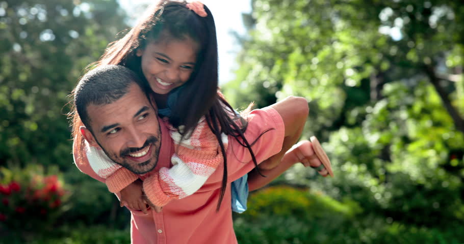 Happy father, girl and piggyback outdoor with games, fun in the sun and excited for bonding, love and support. Mexican dad, family or parent playing with child in nature, garden or park for adventure