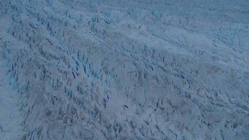 Ice Field of Glacier Perito Moreno, Patagonia Argentina, Calafate, Santa Cruz. Aerial shots of the glacier and ice field, mountains, sunset and sunrise.