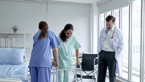 Nurse help women patient with walking aids after received a treatment, doctor standing observation clap hands cheer up, patient happy for cure and can walk again.
 - Powered by Shutterstock - Get 15% off with code: PIKWIZARD15